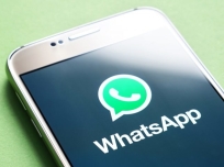 WhatsApp logo on smartphone screen. WhatsApp is an instant messaging service and application.